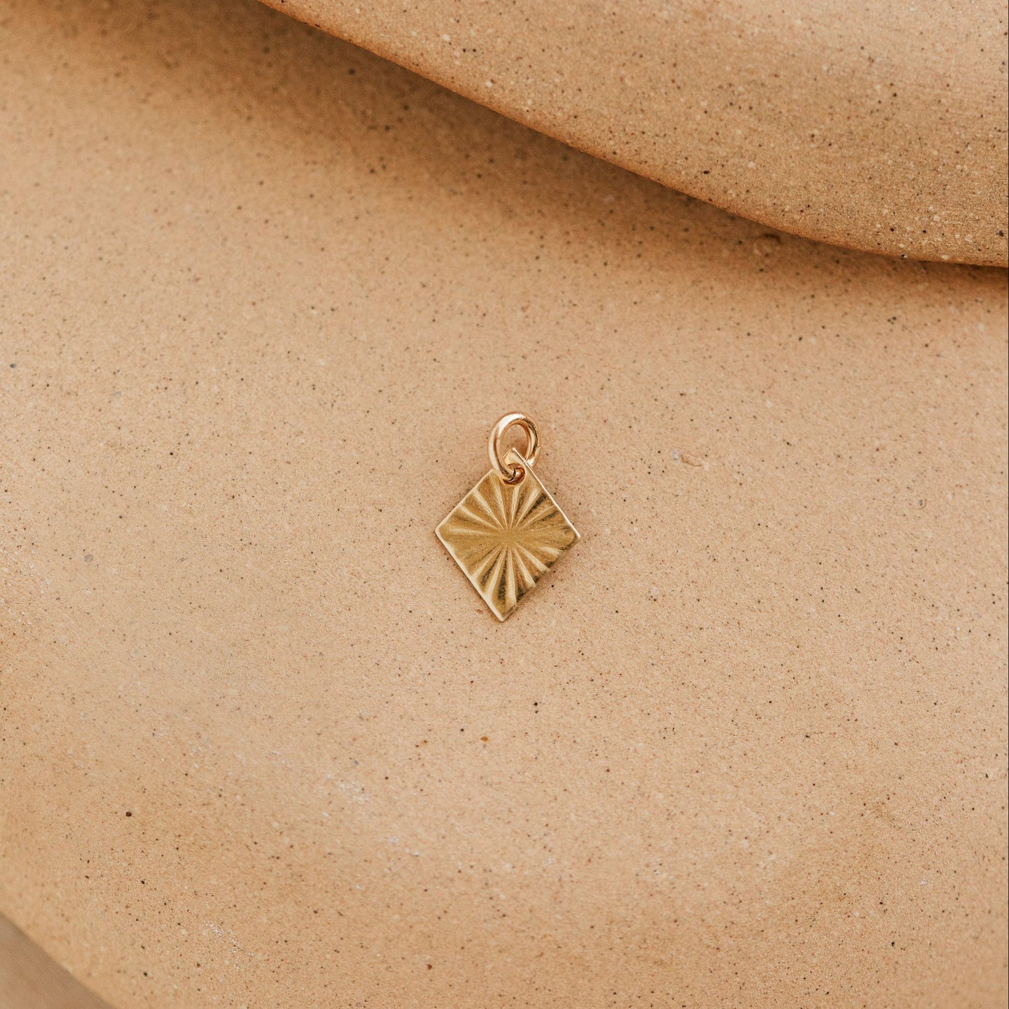 Sunburst Charm