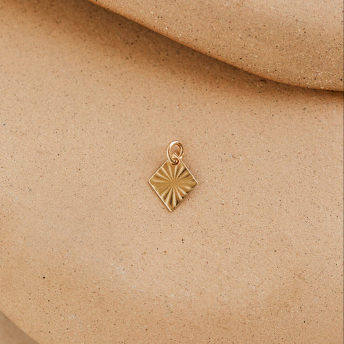 Sunburst Charm